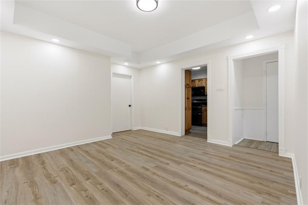 13 Marchmont Street Pittsburgh, PA 15205 - Photo 10 of 29 a view of an empty room with wooden floor