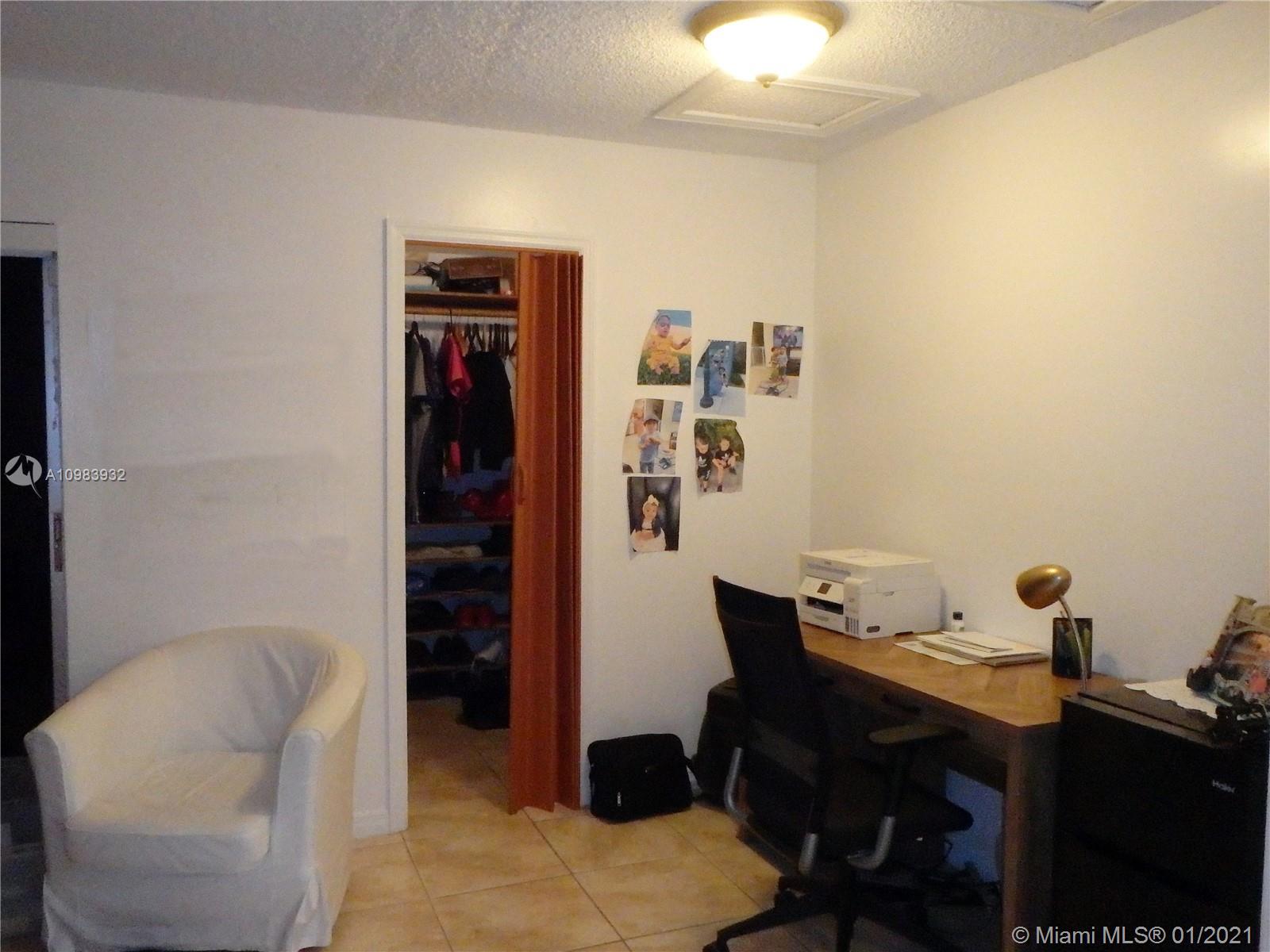 13735 Southwest 84th Street, Unit A Miami, FL 33183 - Photo 12 of 19 a workspace with furniture and window