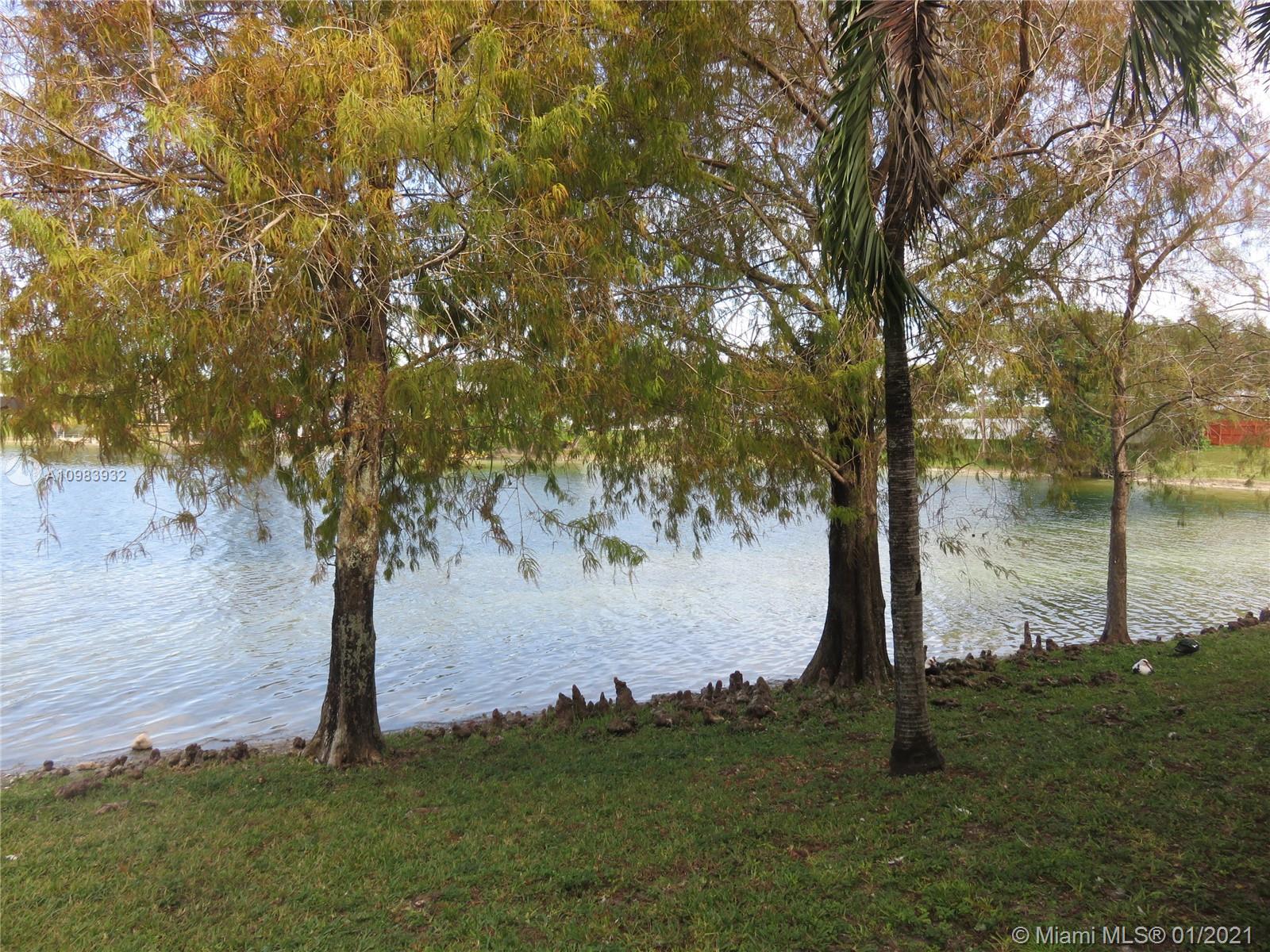 13735 Southwest 84th Street, Unit A Miami, FL 33183 - Photo 18 of 19 a view of a tree in a yard