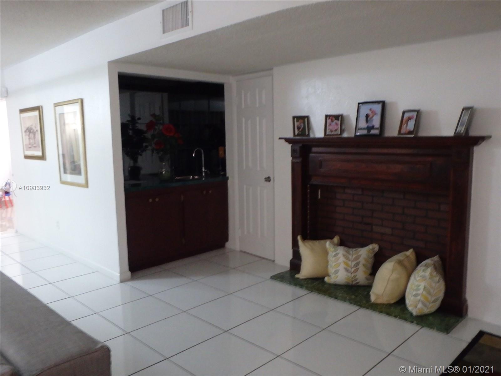 13735 Southwest 84th Street, Unit A Miami, FL 33183 - Photo 3 of 19 a living room with furniture