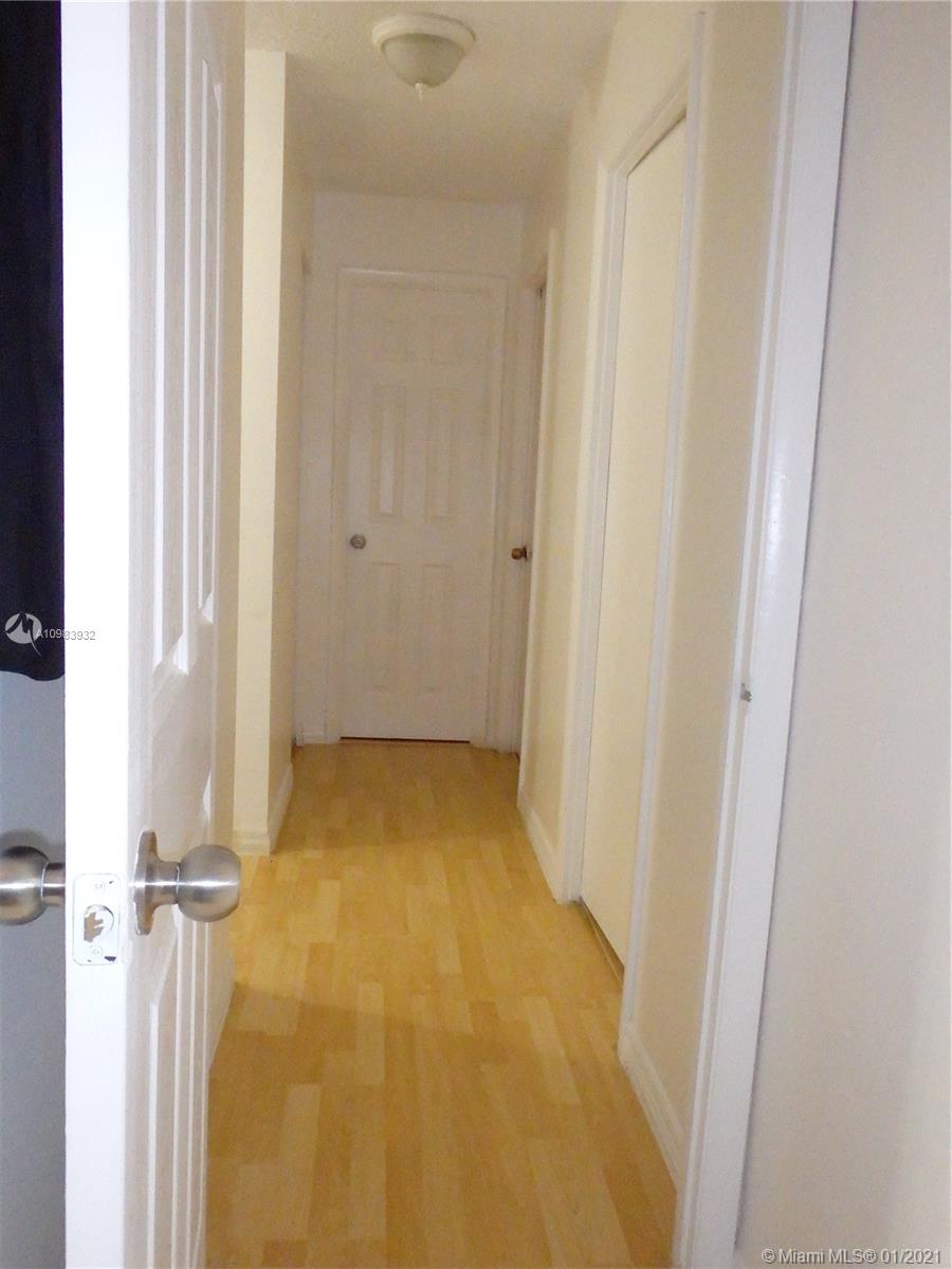13735 Southwest 84th Street, Unit A Miami, FL 33183 - Photo 9 of 19 a view of an empty room
