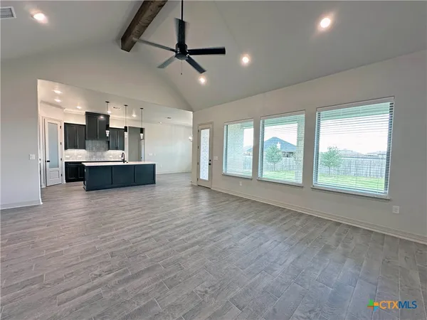 a view of kitchen and windows