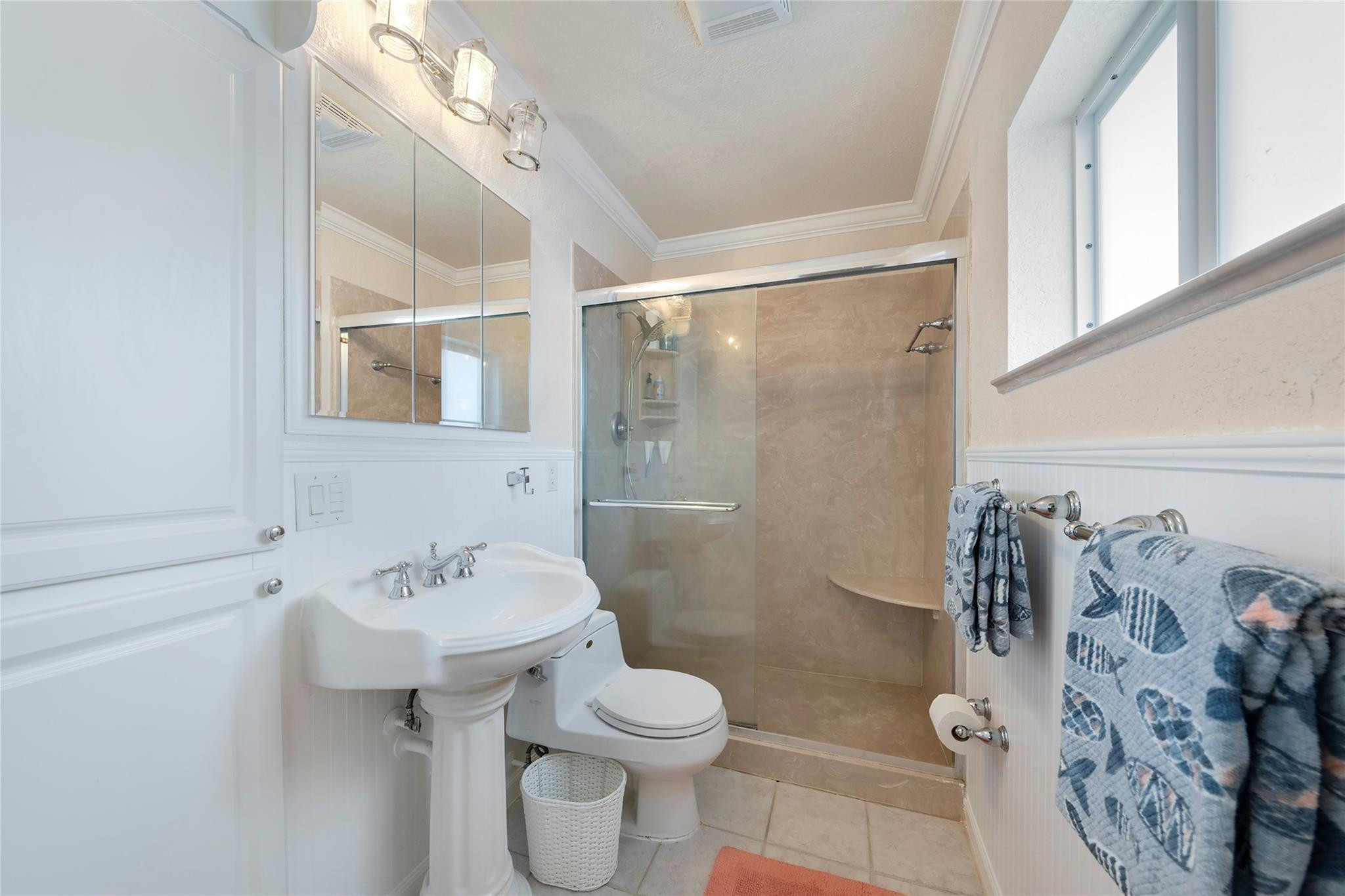 2061 North Conference Drive Boca Raton, FL 33486 - Photo 18 of 27 a bathroom with a sink toilet and shower