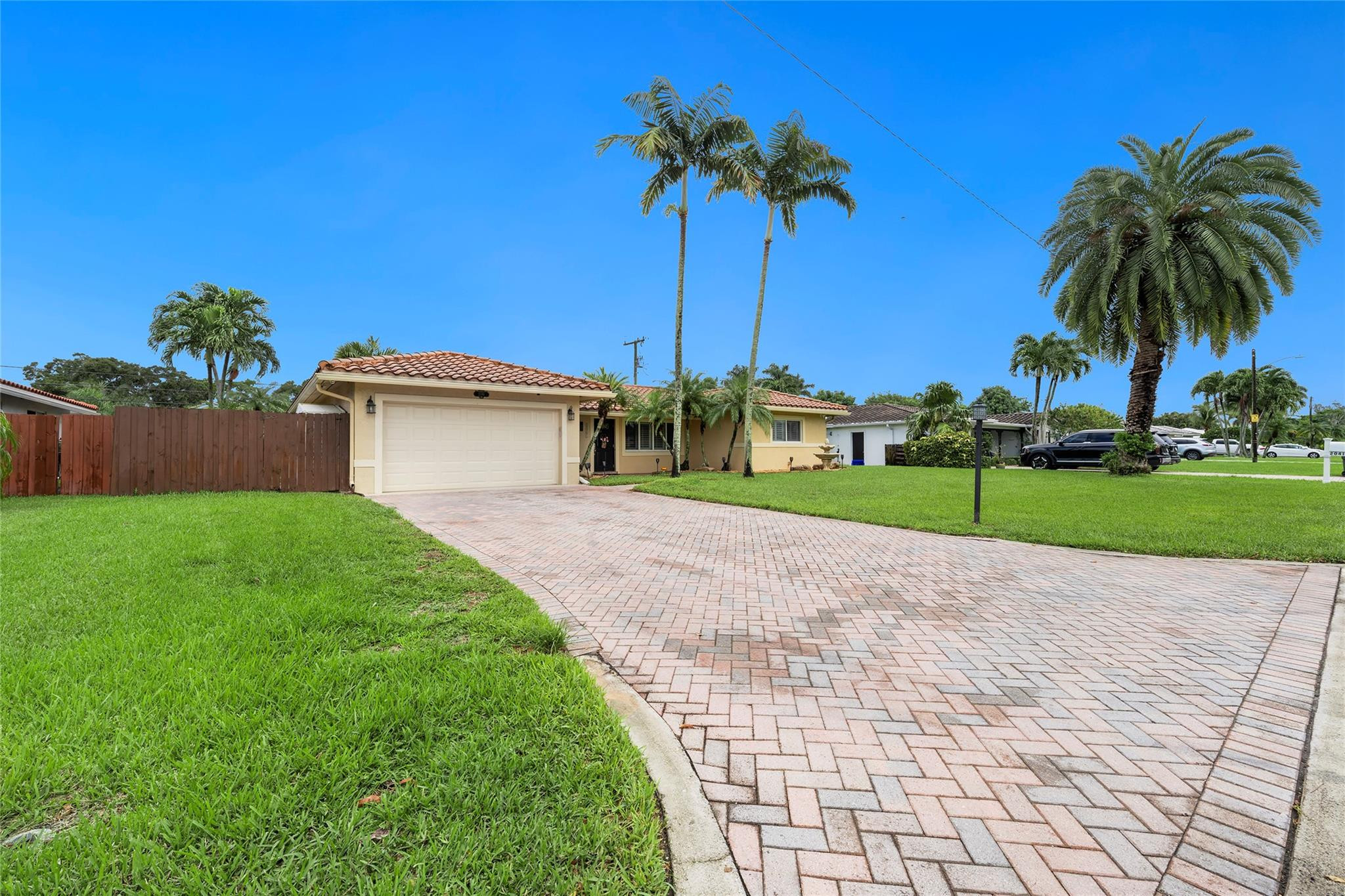 2061 North Conference Drive Boca Raton, FL 33486 - Photo 26 of 27 a house with a garden view
