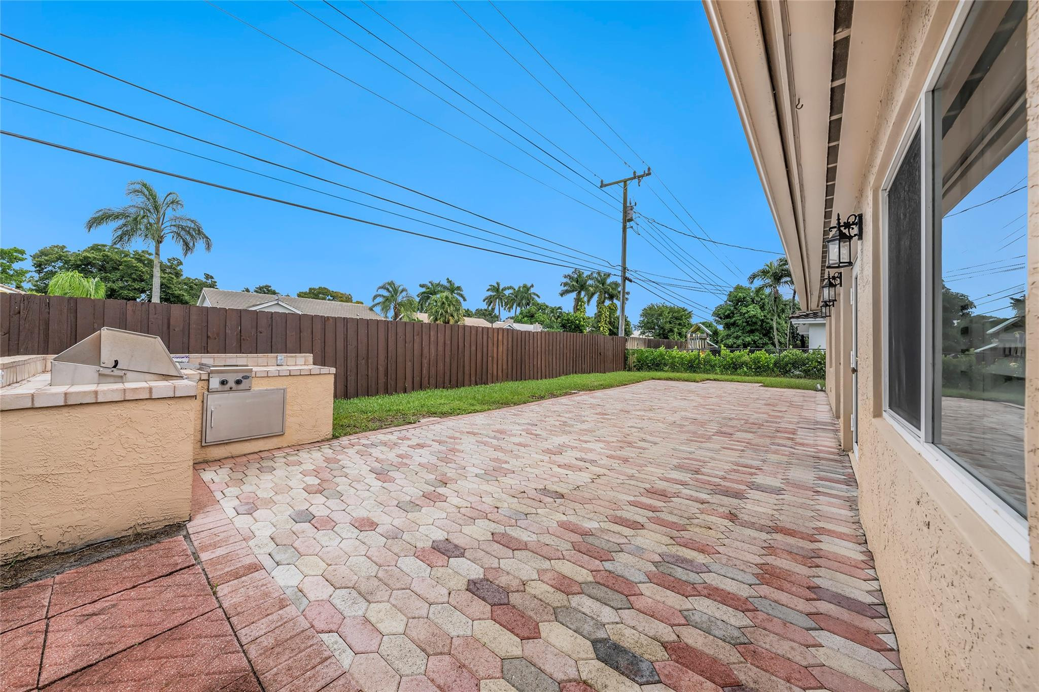 2061 North Conference Drive Boca Raton, FL 33486 - Photo 3 of 27 a view of a backyard of the house