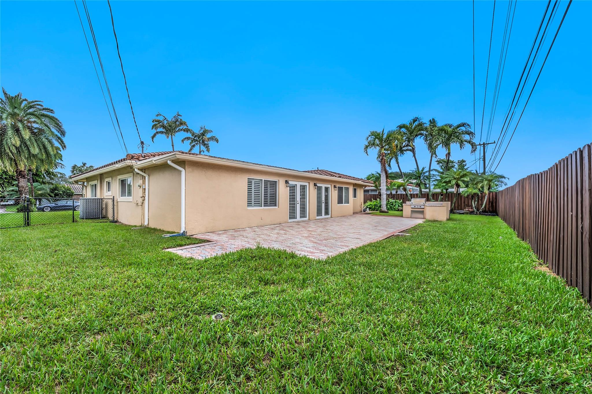 2061 North Conference Drive Boca Raton, FL 33486 - Photo 4 of 27 a view of a house with backyard and sitting area