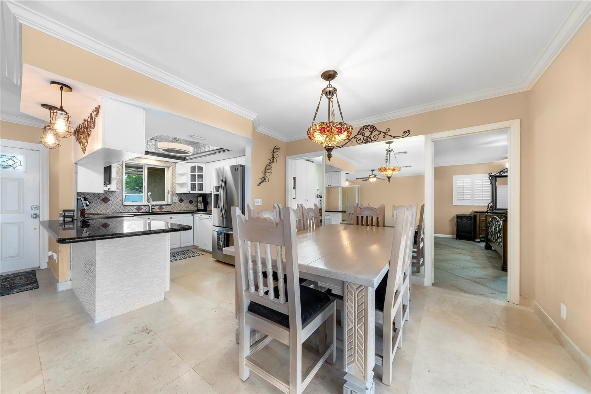 2061 North Conference Drive Boca Raton, FL 33486 - Photo 8 of 27 a view of a dining room and livingroom view