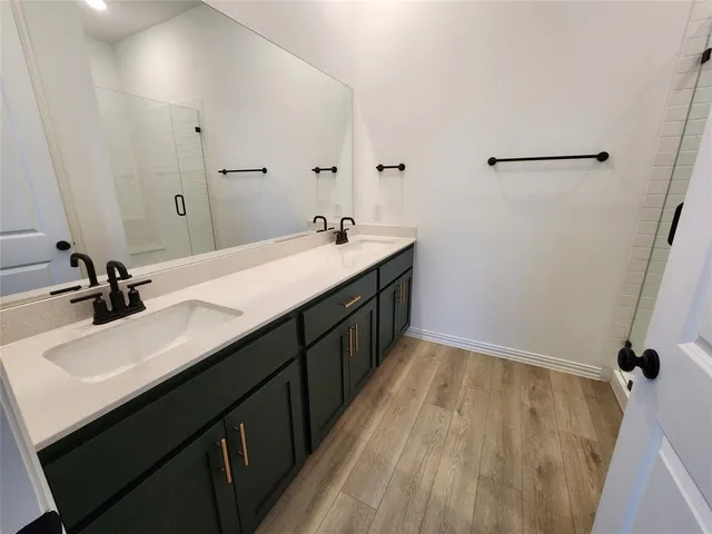 a bathroom with a toilet and shower