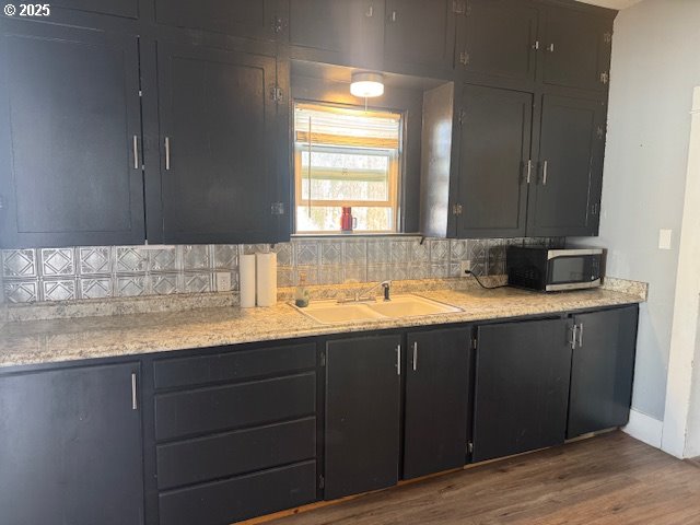 2800 10th Street Baker City, OR 97814 - Photo 14 of 23 a bathroom with a granite countertop sink mirror and a