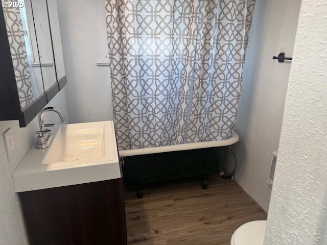 2800 10th Street Baker City, OR 97814 - Photo 17 of 23 a bathroom with a sink toilet and shower