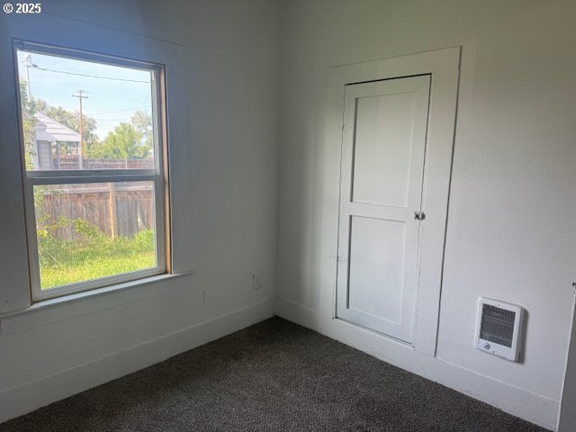 2800 10th Street Baker City, OR 97814 - Photo 19 of 23 an empty room with windows and closet