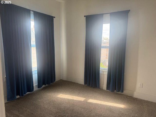 2800 10th Street Baker City, OR 97814 - Photo 9 of 23 an empty room with windows and closet