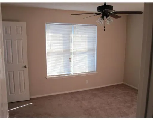 a view of a window in an empty room