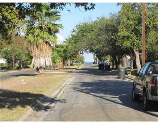 a view of road with trees