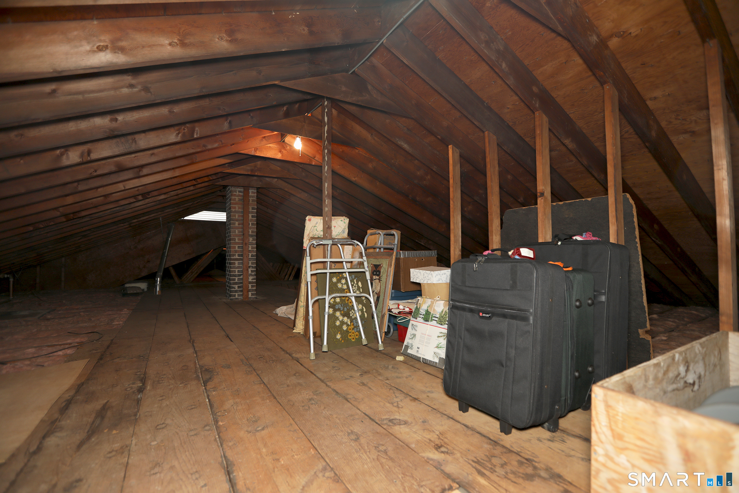 9 Westbrook Road Bloomfield, CT 06002 - Photo 11 of 20 The Attic has flooring and could easily be converted to livable space.