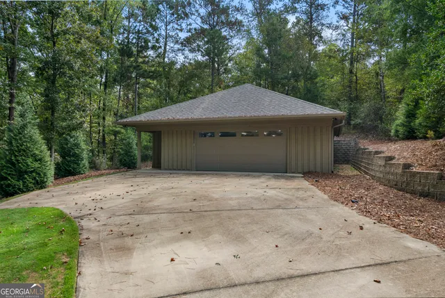 a view of a a dining room with furniture window and wooden floor