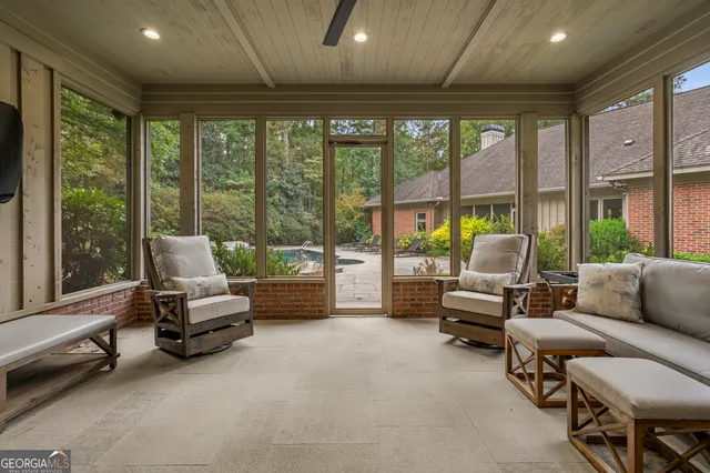 a kitchen with granite countertop a sink and a counter top space