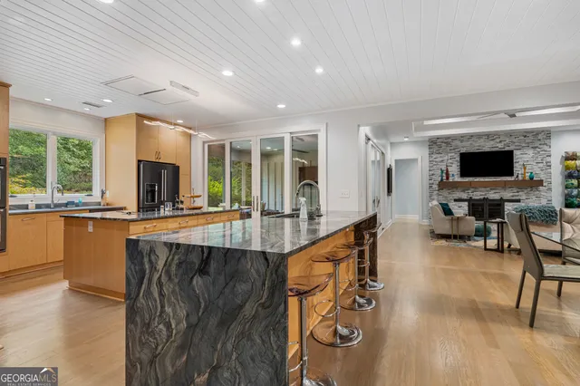 a bedroom with a bed and lamp with window