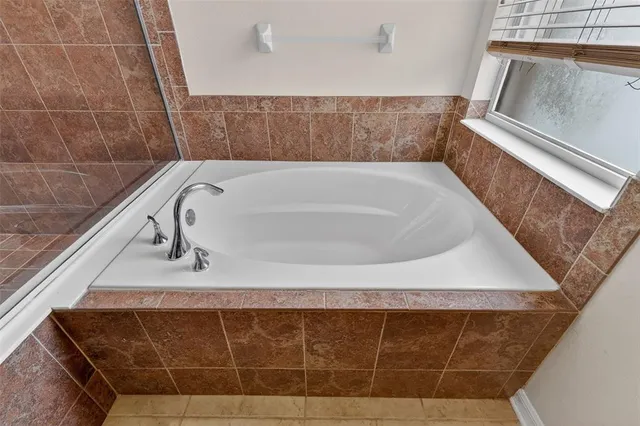 a bathroom with a bathtub