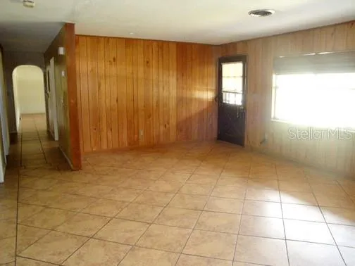 a view of an empty room and window