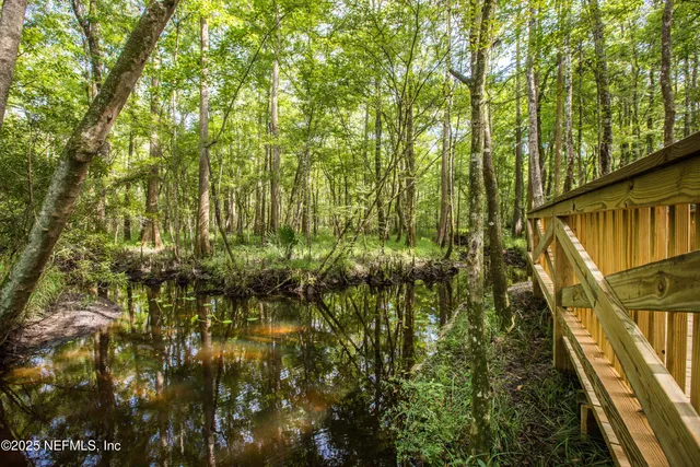a view of a swimming pool with a porch