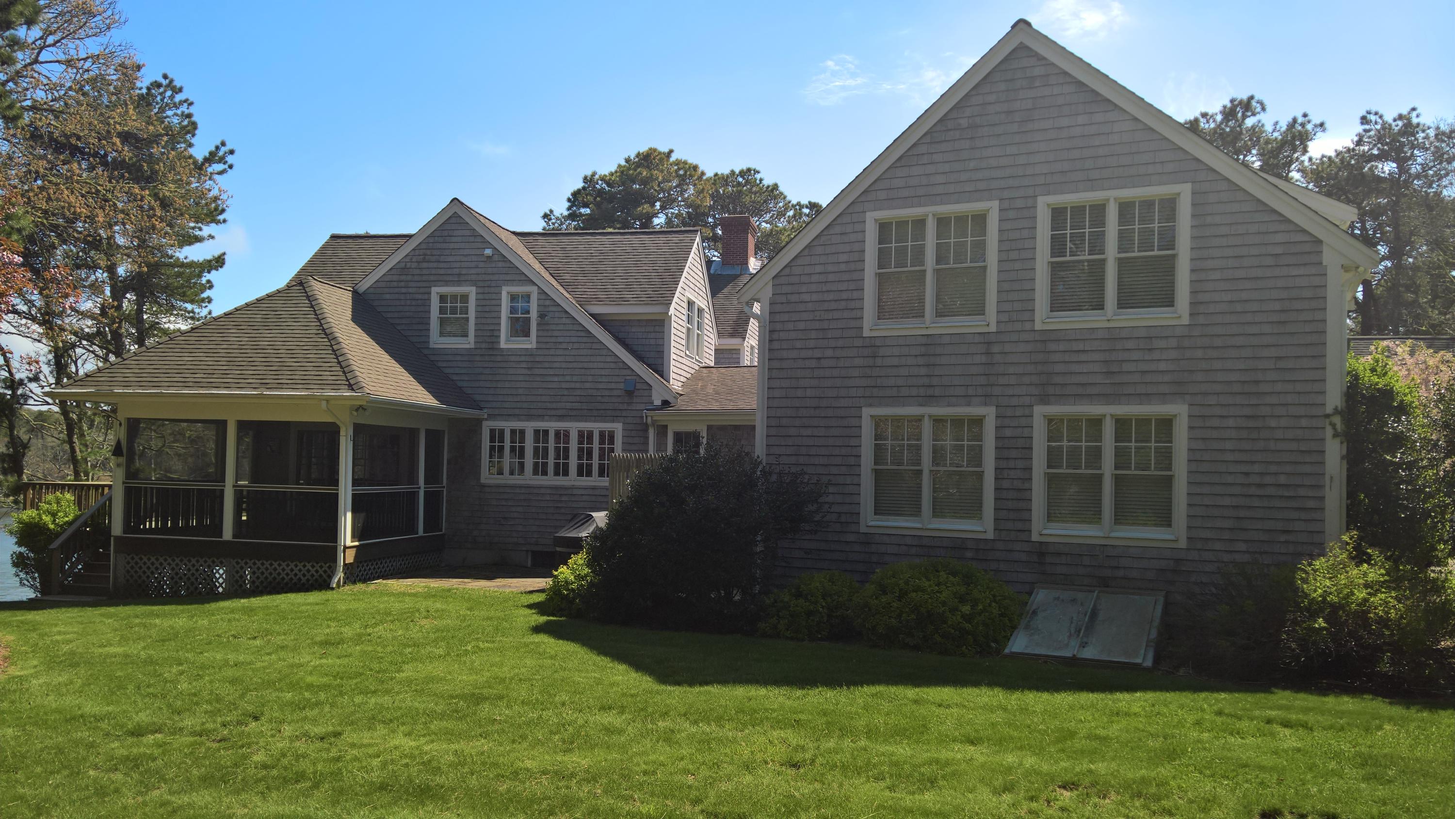 16 Thayer Lane Orleans, MA 02653 - Photo 24 of 35 a view of a house with a yard
