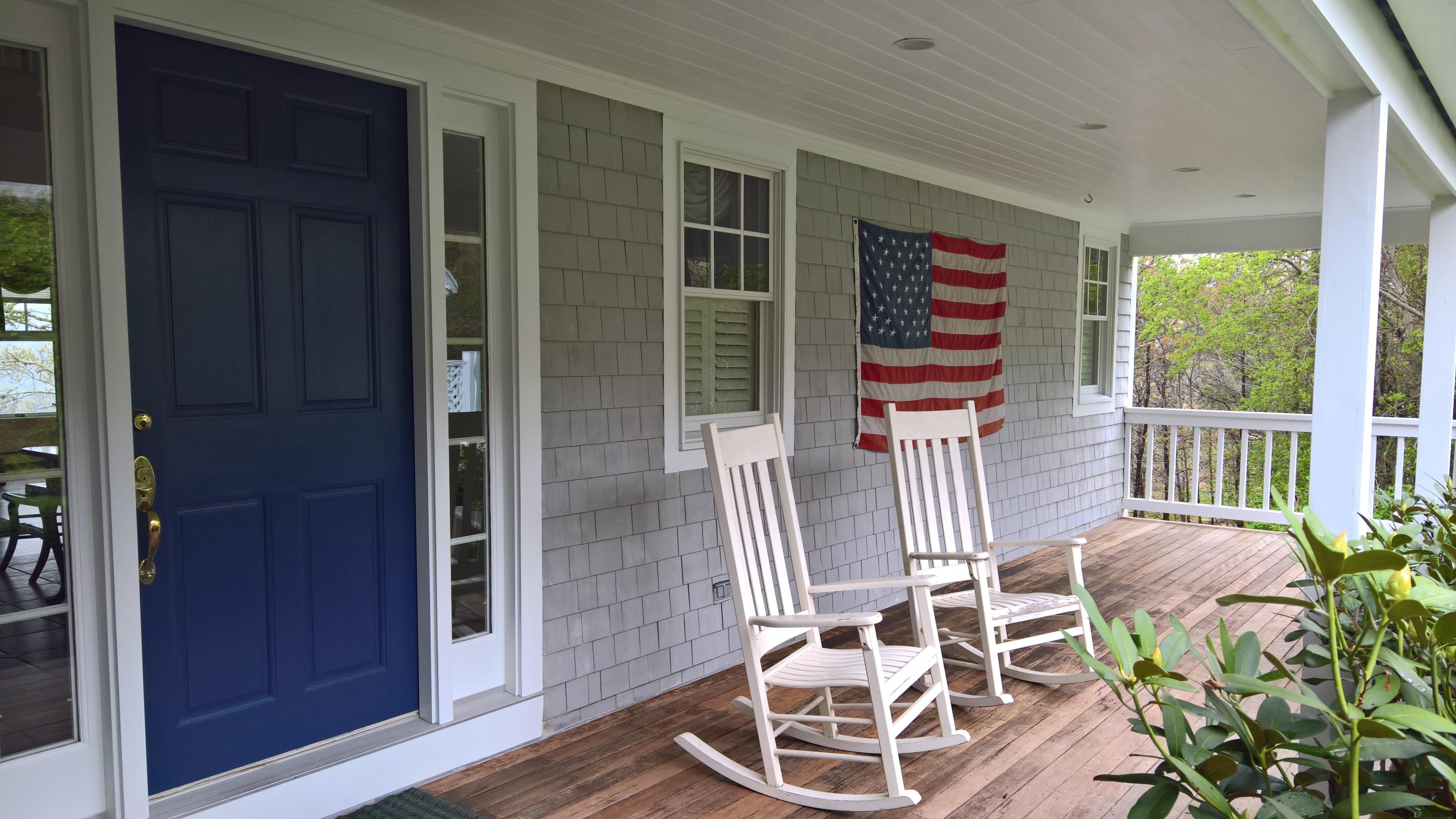 16 Thayer Lane Orleans, MA 02653 - Photo 26 of 35 a living room with furniture and a floor to ceiling window