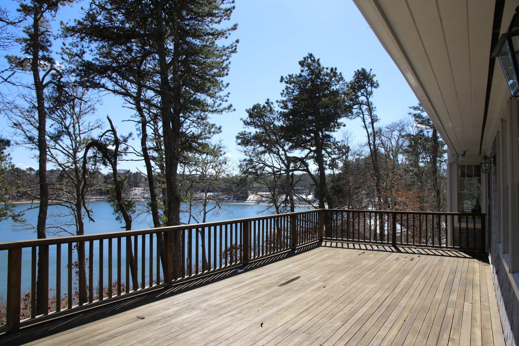 16 Thayer Lane Orleans, MA 02653 - Photo 28 of 35 a view of balcony with wooden floor and fence