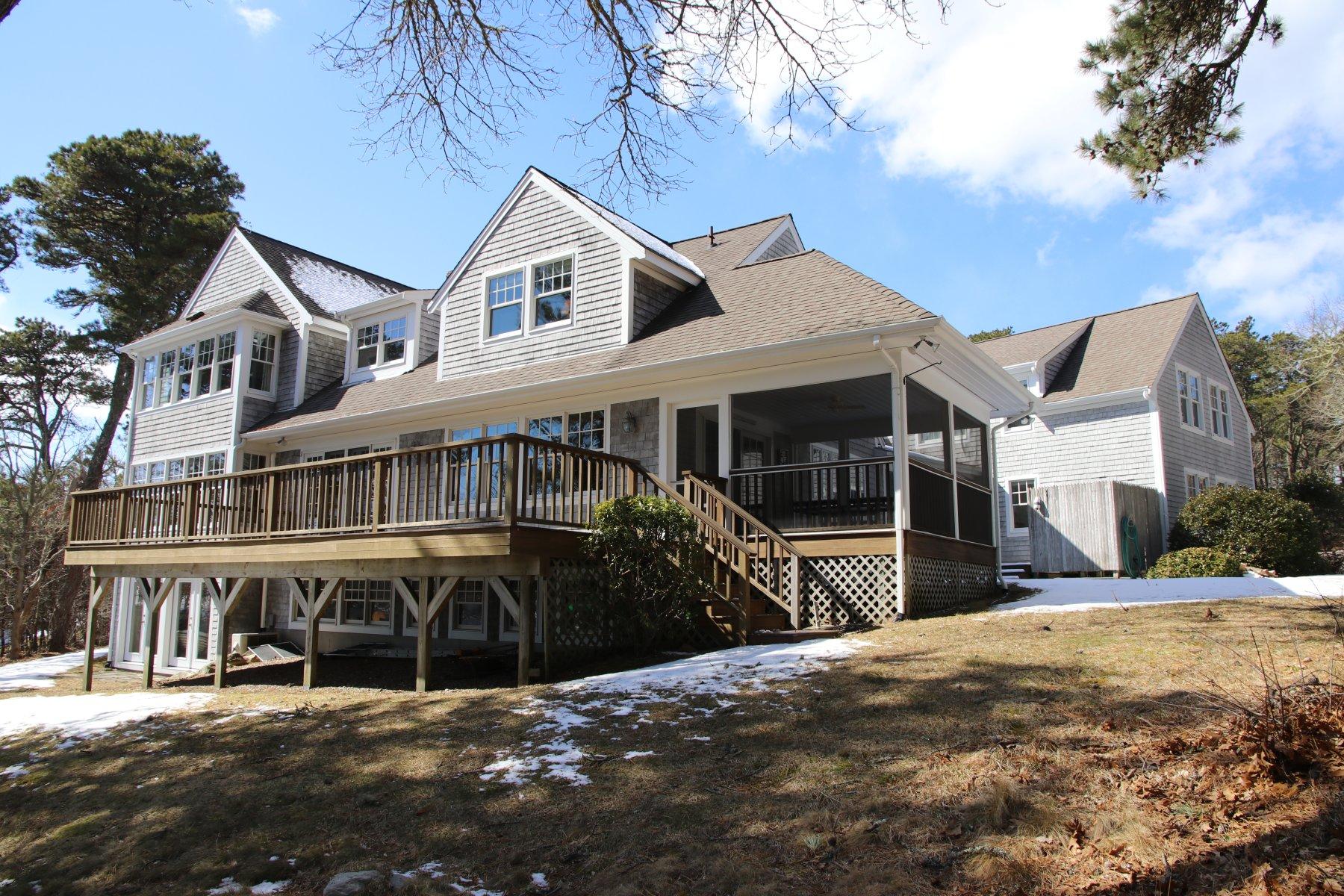 16 Thayer Lane Orleans, MA 02653 - Photo 30 of 35 a view of a house with wooden roof and large trees