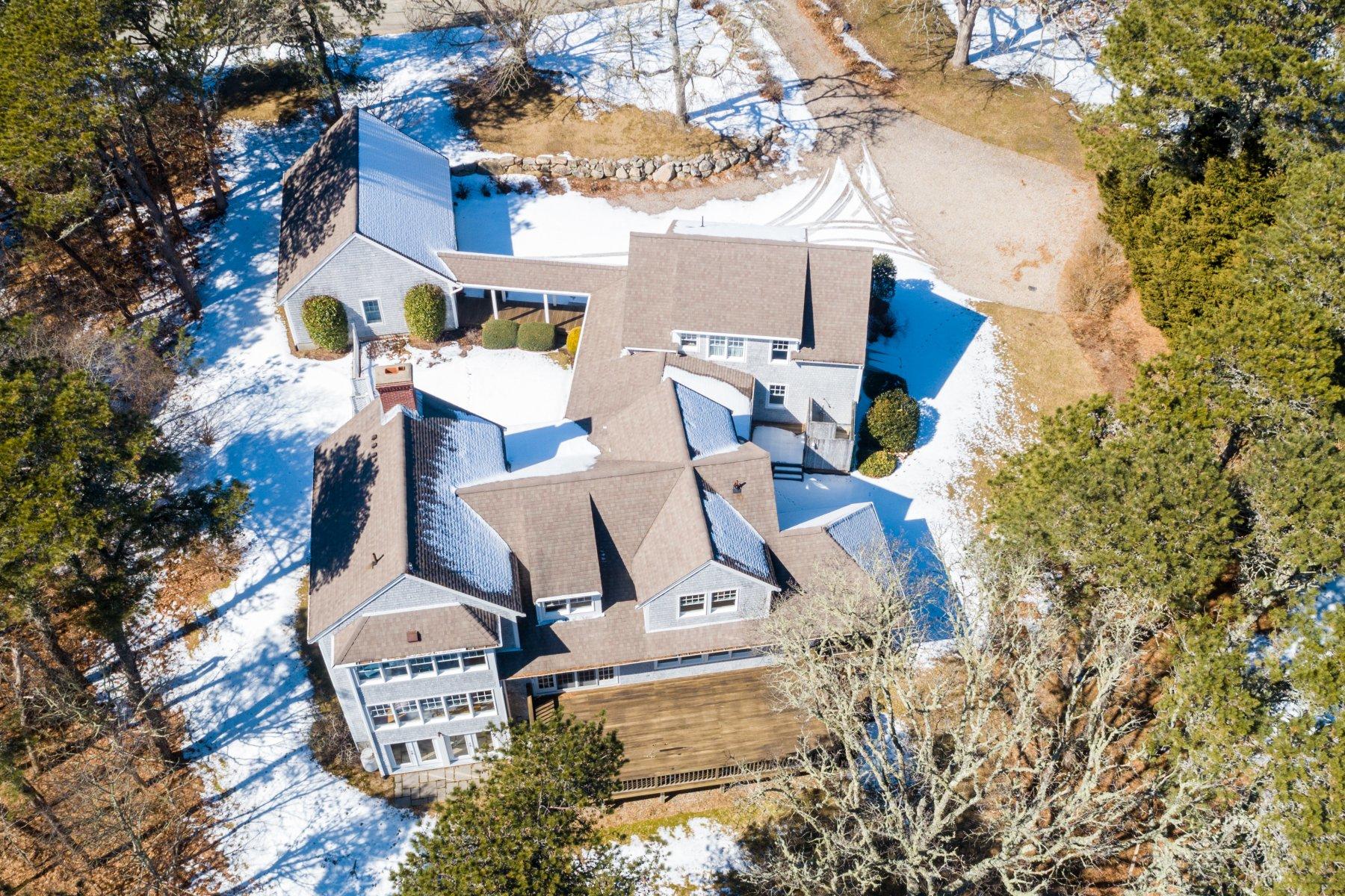 16 Thayer Lane Orleans, MA 02653 - Photo 5 of 35 an aerial view of a house with yard and trees
