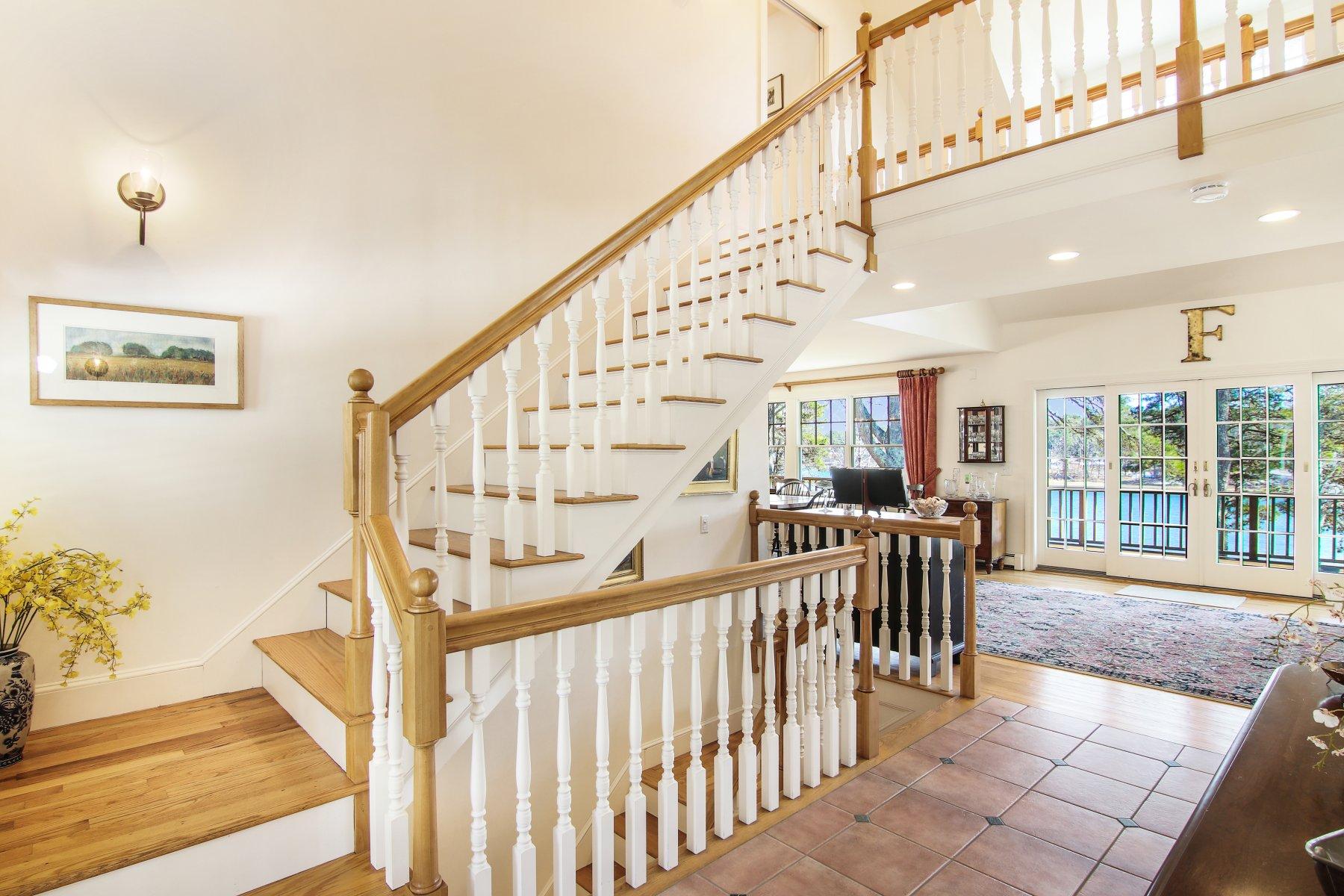 16 Thayer Lane Orleans, MA 02653 - Photo 6 of 35 a view of entryway and hall with wooden floor
