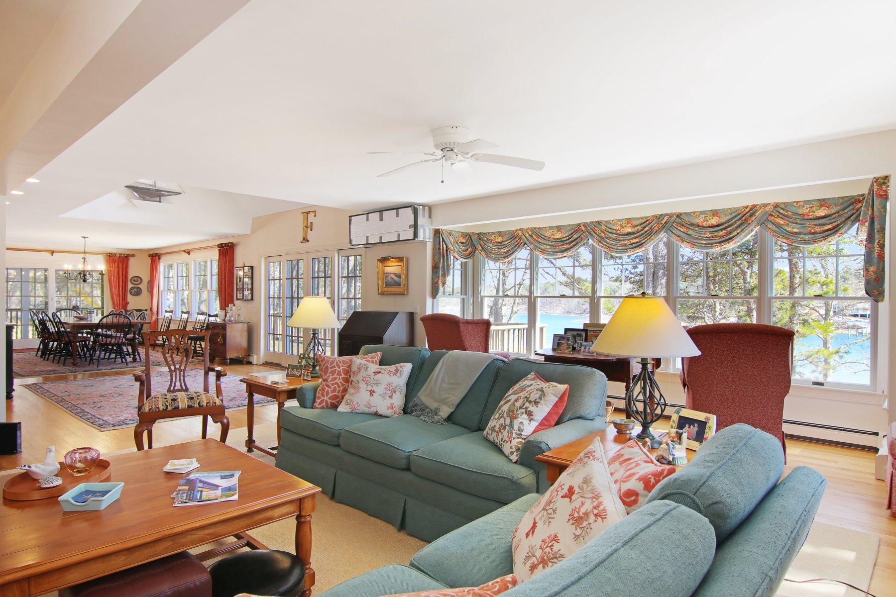 16 Thayer Lane Orleans, MA 02653 - Photo 7 of 35 a living room with furniture and a large window