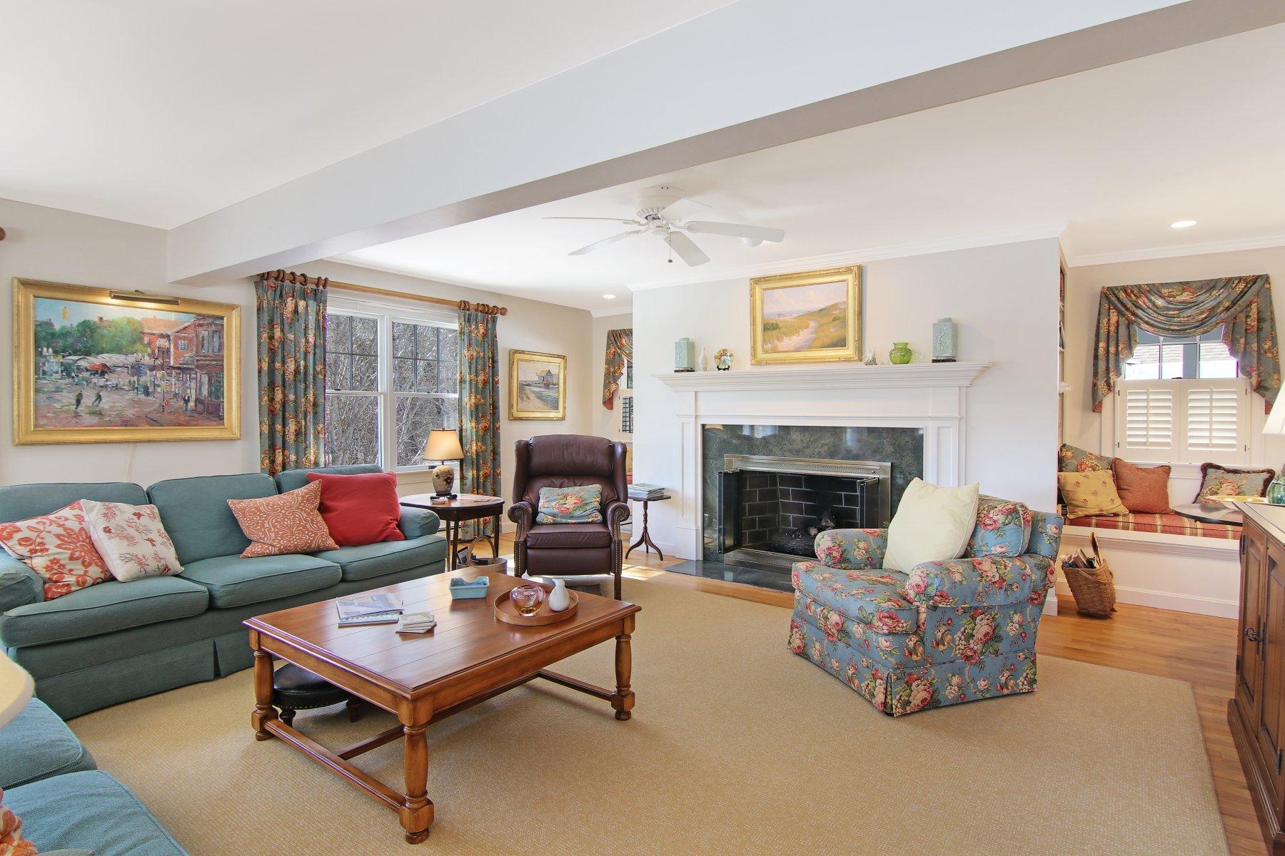 16 Thayer Lane Orleans, MA 02653 - Photo 8 of 35 a living room with furniture and a fireplace