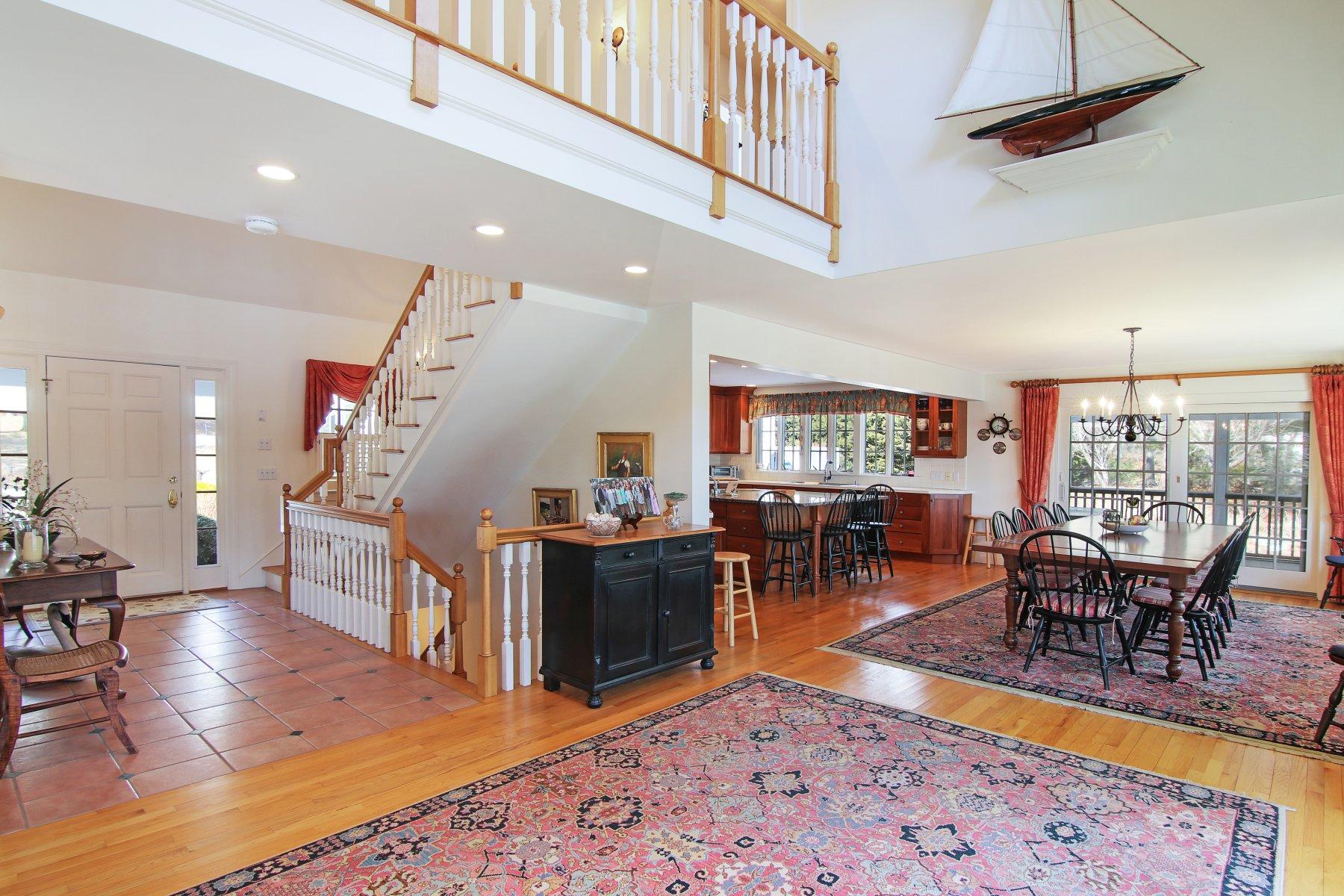 16 Thayer Lane Orleans, MA 02653 - Photo 10 of 35 a living room with lots of furniture and a flat screen tv
