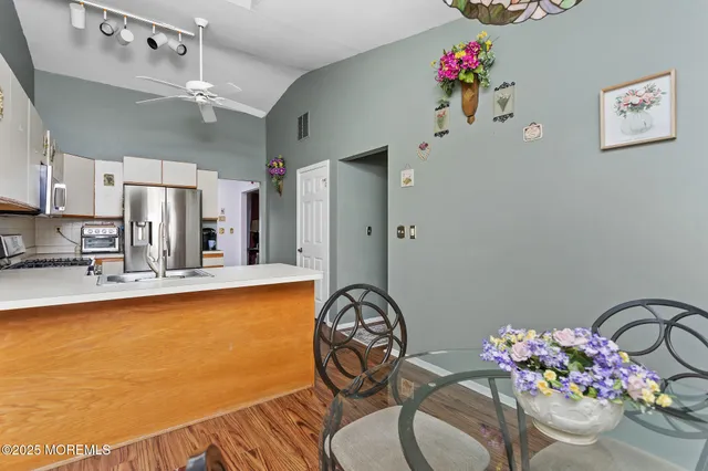 a living room with furniture and a table