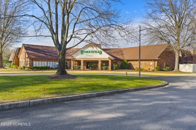 a outdoor living space with furniture and a potted plant
