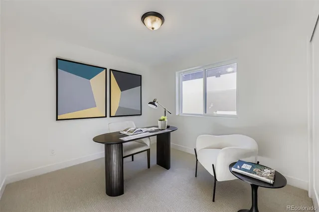 a room with furniture and a window