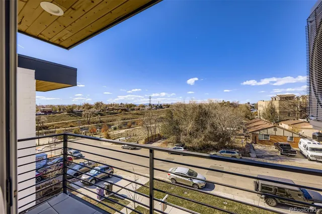 a view of a balcony with an ocean view