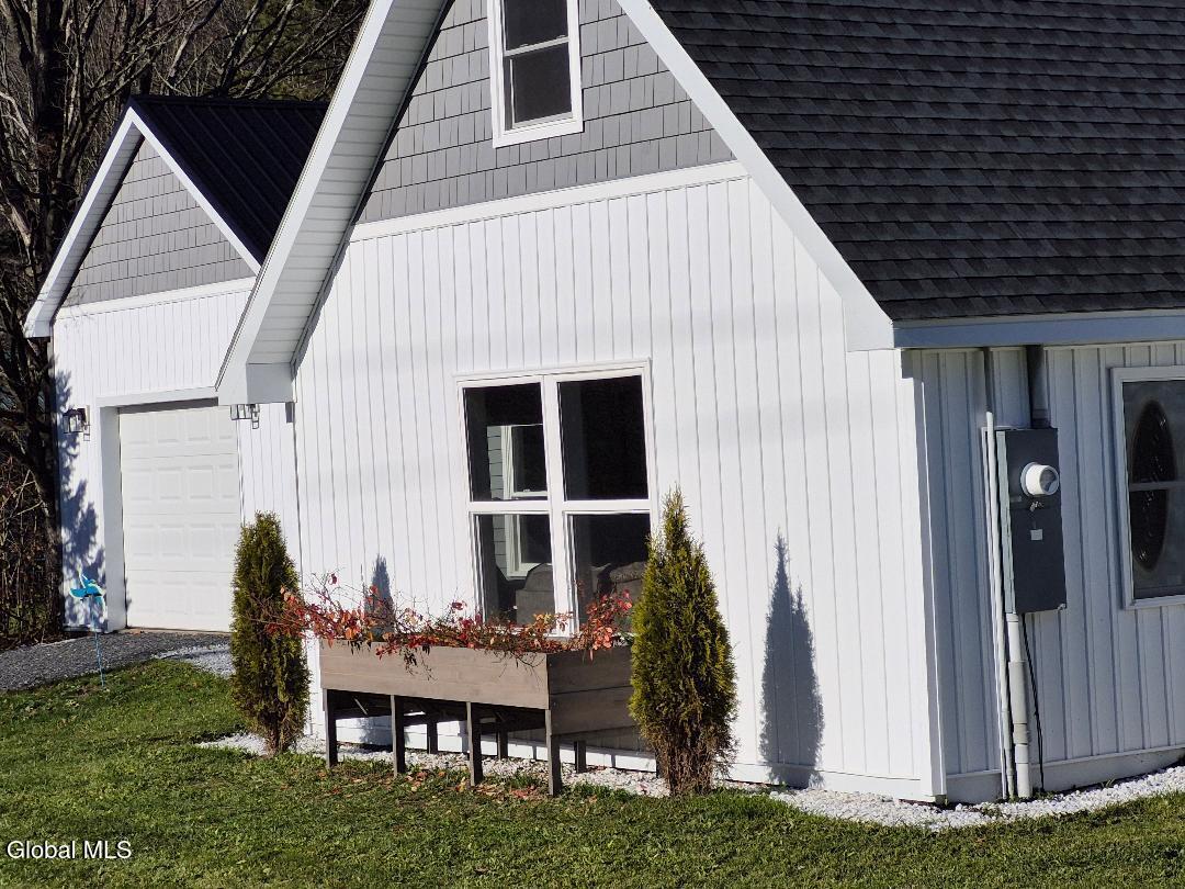 36 Brookside Acres Road Granville, NY 12832 - Photo 5 of 31 front with planter