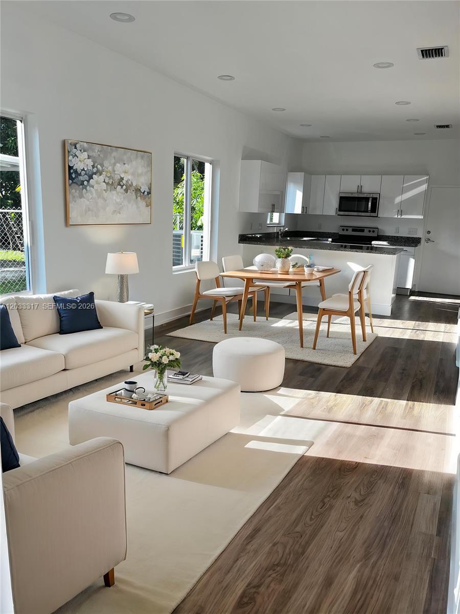 37 Northwest 70th Street, Unit B Miami, FL 33150 - Photo 1 of 17 Living Room and Dining Room Virtually Staged