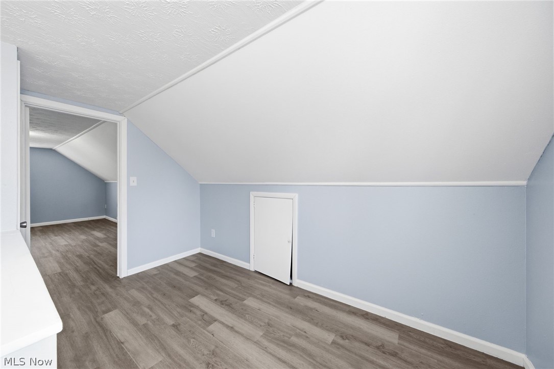 20705 Hansen Road Maple Heights, OH 44137 - Photo 15 of 24 Bonus room with wood finished floors