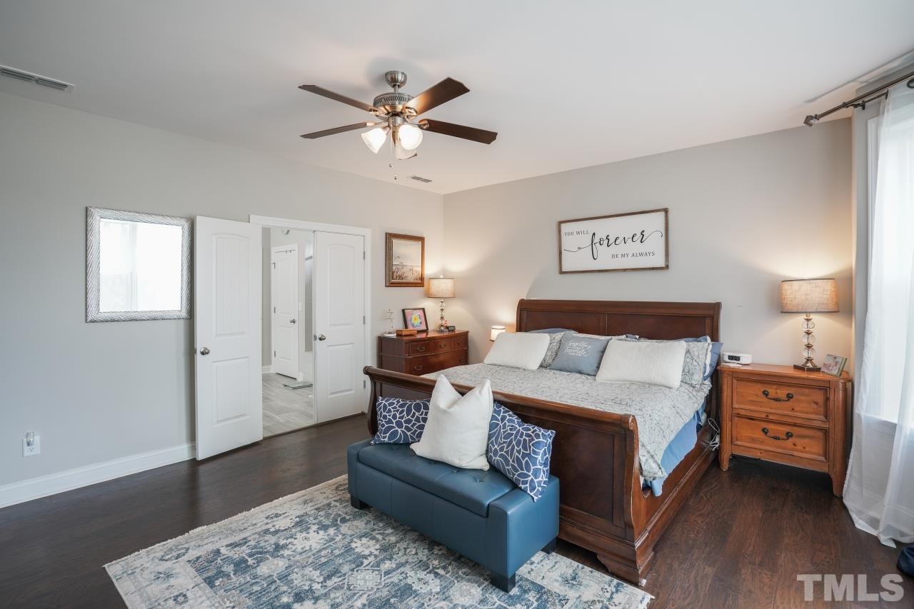 3373 Willow Green Drive Apex, NC 27502 - Photo 17 of 42 a bed room with a bed and a window