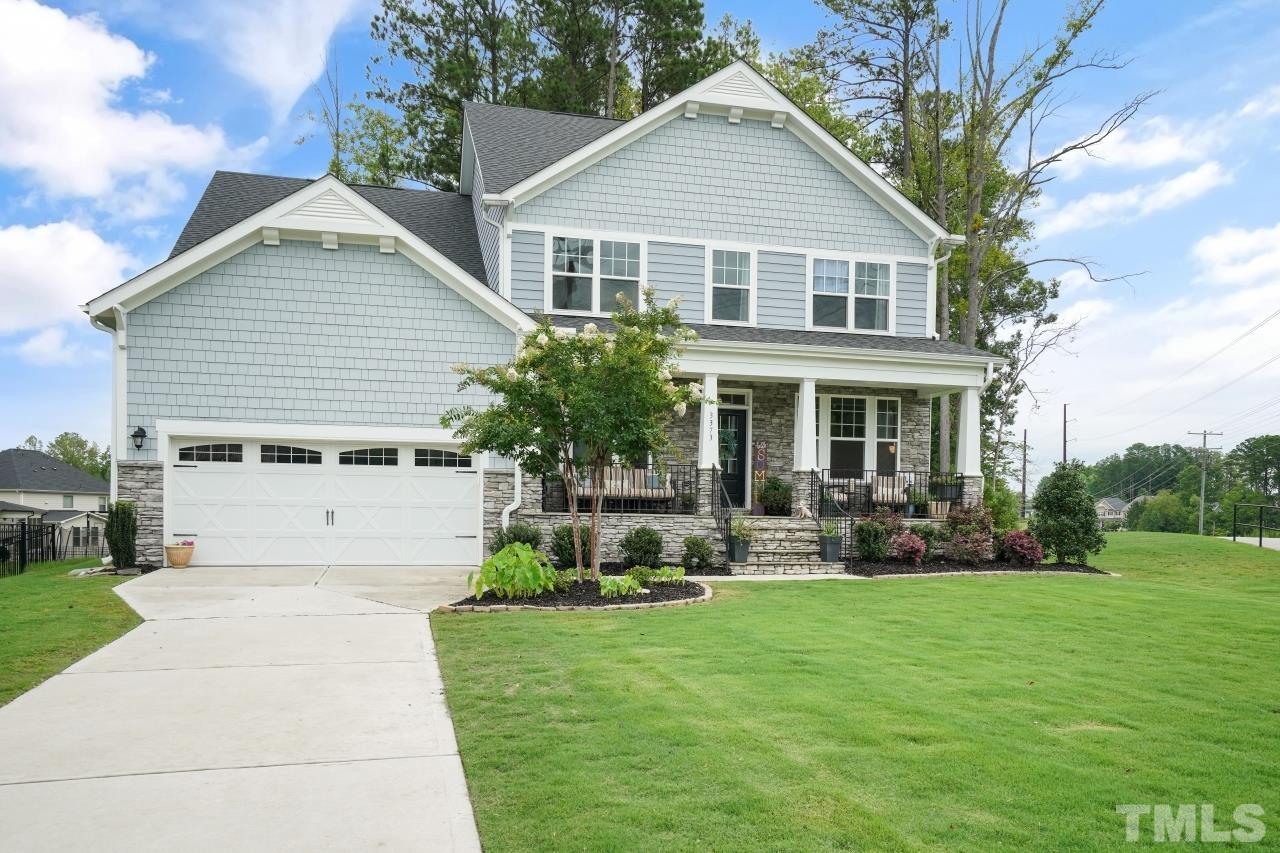 3373 Willow Green Drive Apex, NC 27502 - Photo 2 of 42 a front view of house with yard and green space
