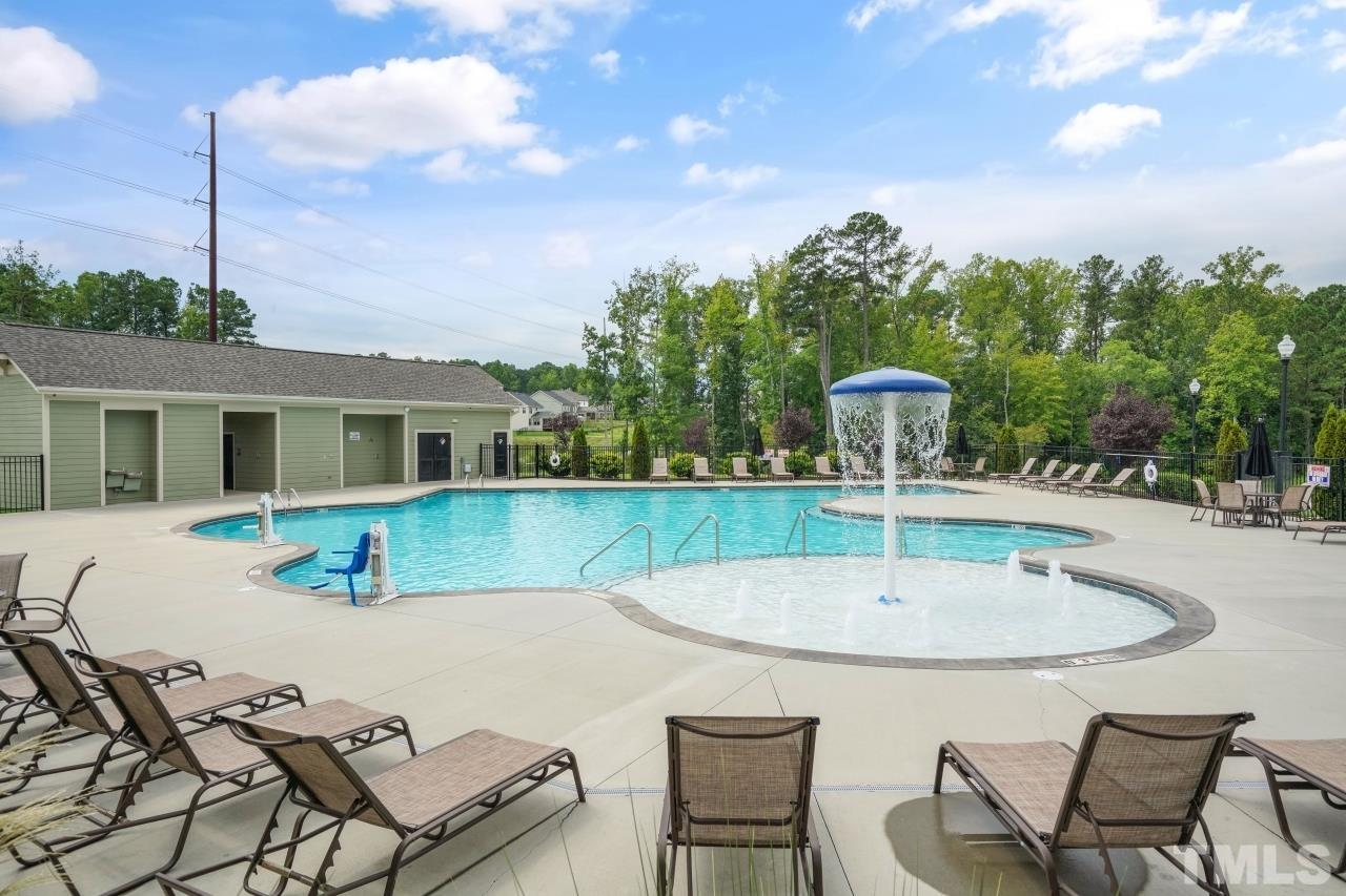 3373 Willow Green Drive Apex, NC 27502 - Photo 41 of 42 a view of a house with swimming pool and a sitting area