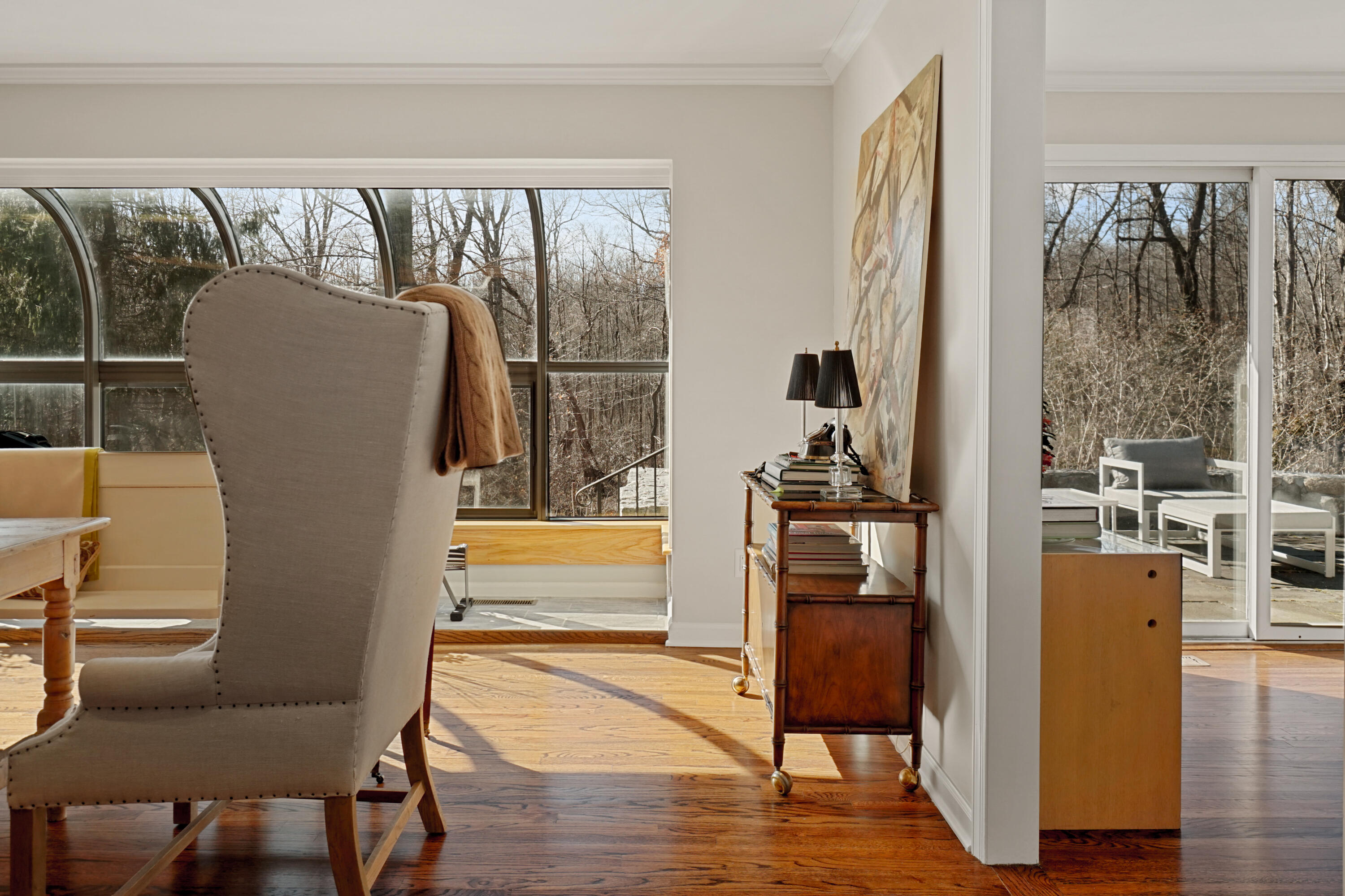 102 Ludlowe Road New Canaan, CT 06840 - Photo 18 of 42 a hallway with chairs and a wooden floor