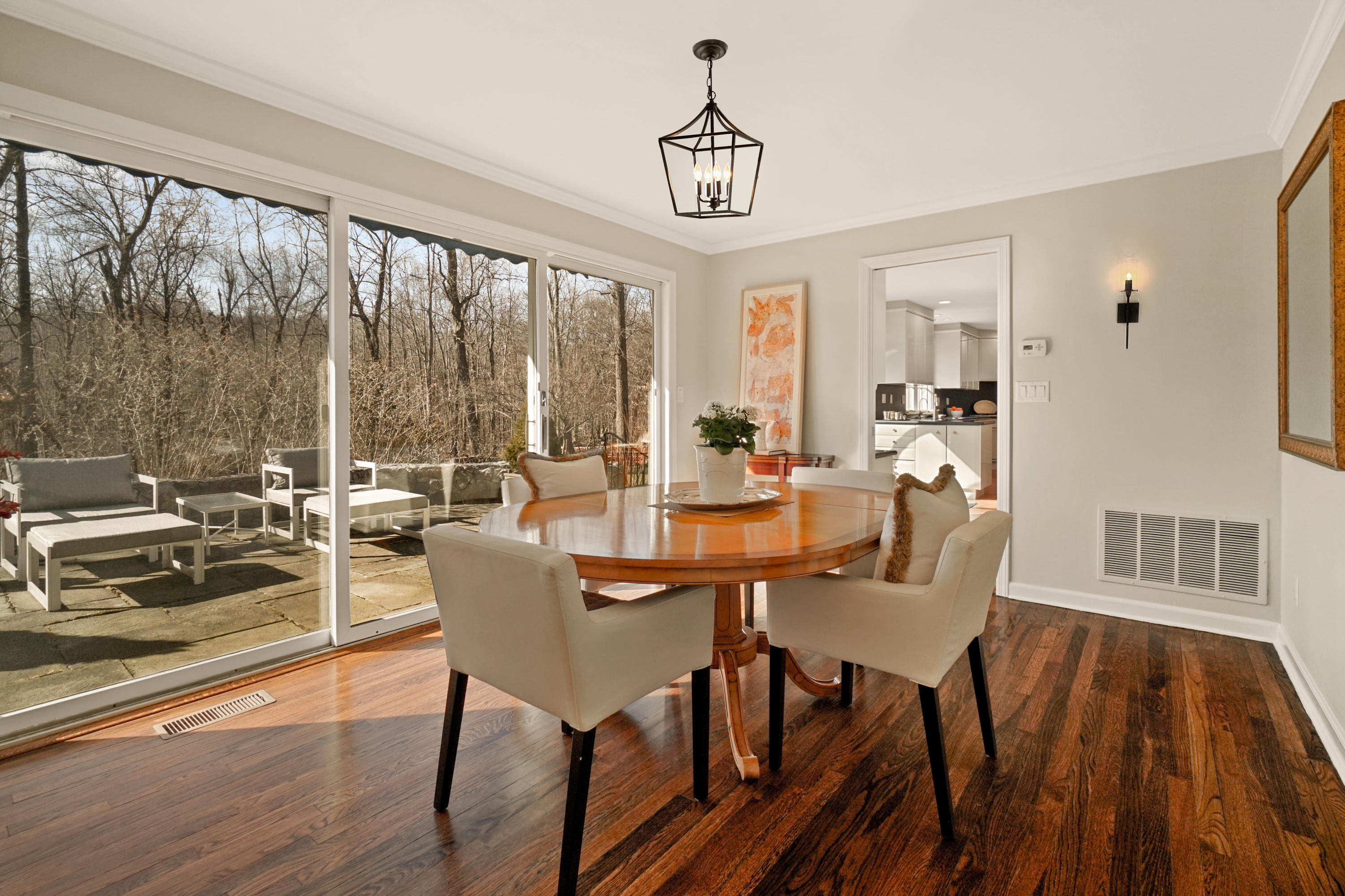 102 Ludlowe Road New Canaan, CT 06840 - Photo 20 of 42 a view of a dining room with furniture window and outside view