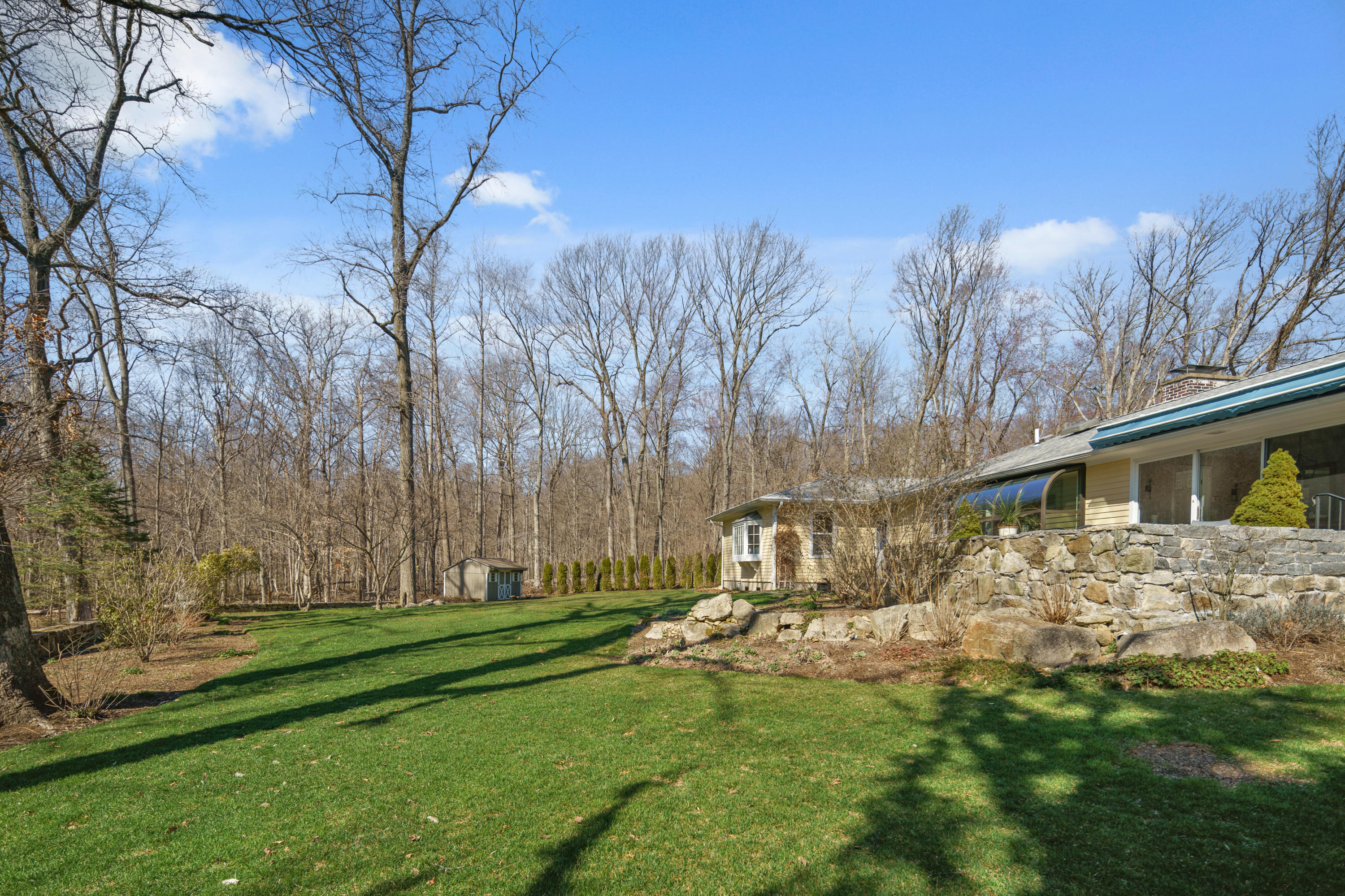 102 Ludlowe Road New Canaan, CT 06840 - Photo 3 of 42 a view of backyard with tree
