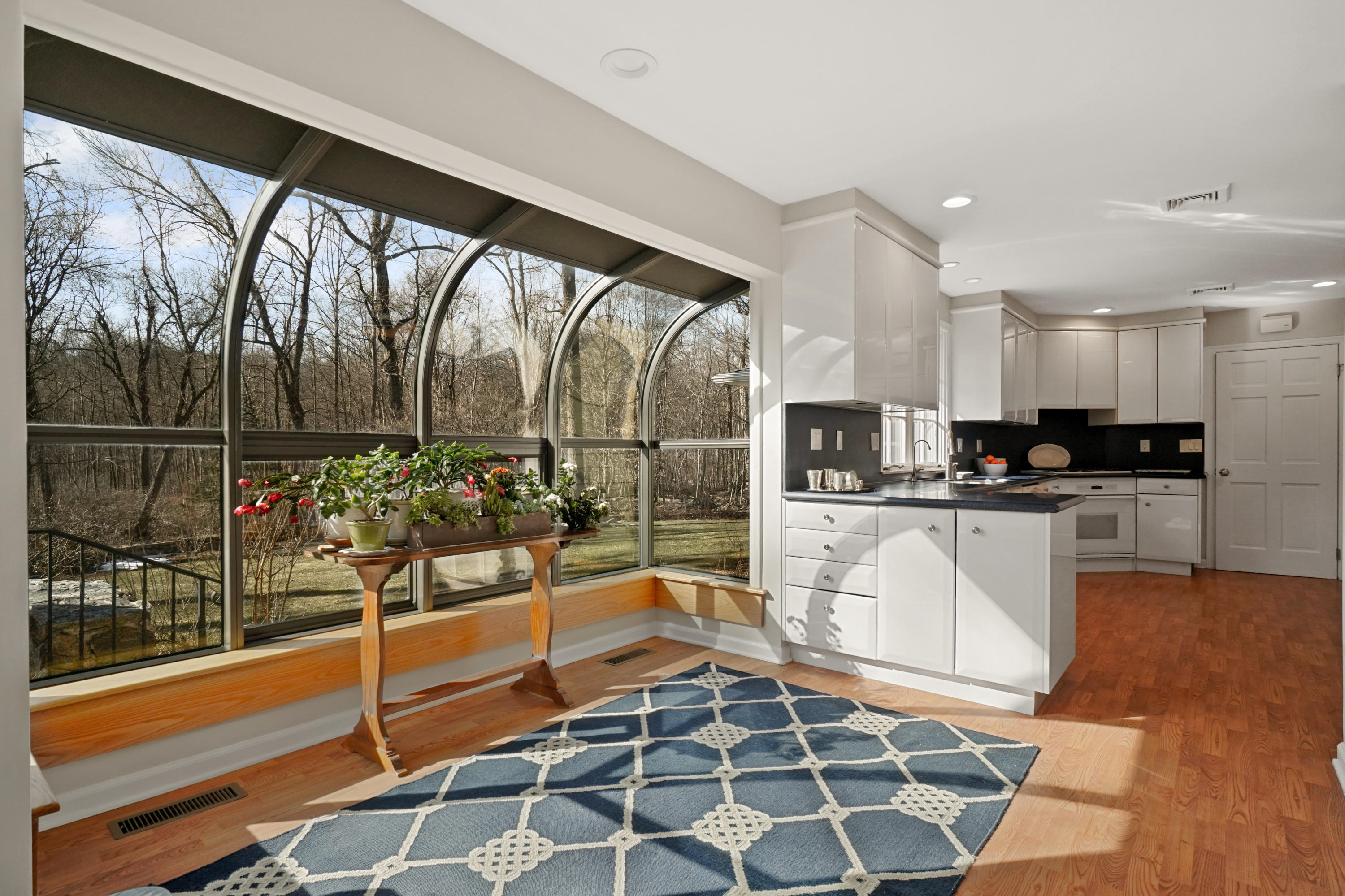 102 Ludlowe Road New Canaan, CT 06840 - Photo 21 of 42 a kitchen with stainless steel appliances kitchen island granite countertop a refrigerator and cabinets