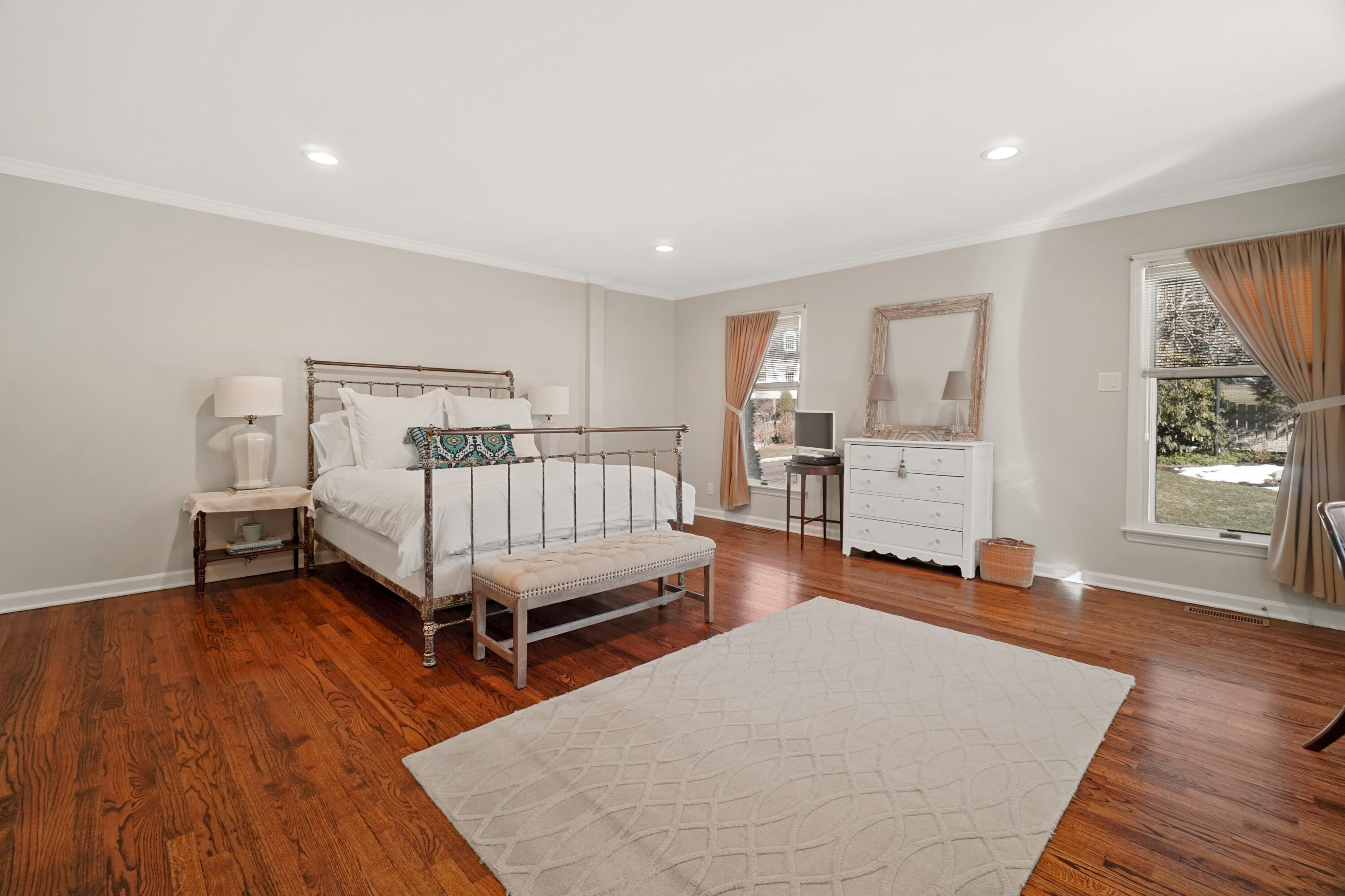 102 Ludlowe Road New Canaan, CT 06840 - Photo 27 of 42 a bedroom with furniture and a wooden floor
