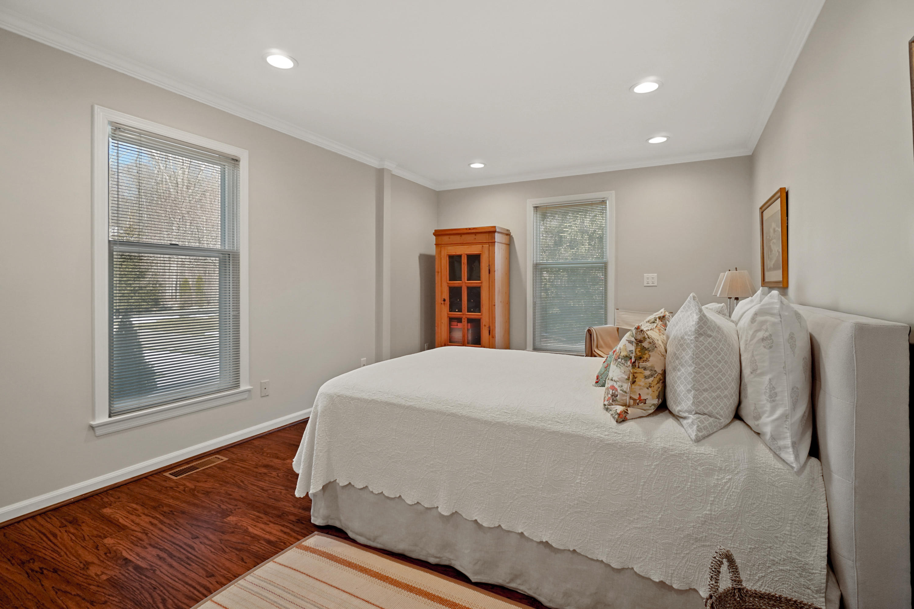 102 Ludlowe Road New Canaan, CT 06840 - Photo 32 of 42 a bedroom with a large bed and a window